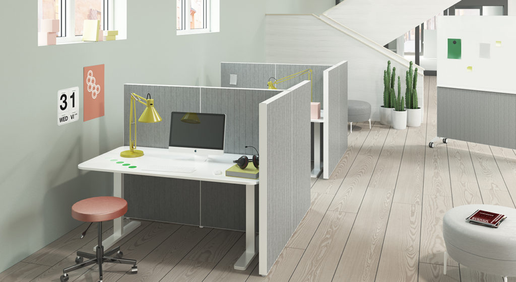 Installation featuring acoustic Alumi Screen office workspace grey plant desk chair table sound absorbing
