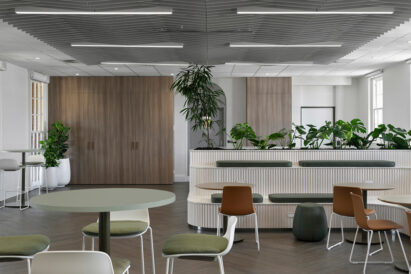 acoustic ceiling tile above dining area with various seating