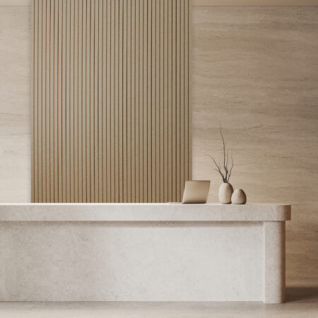 tan acoustic panel with vertical linear grooves behind reception area