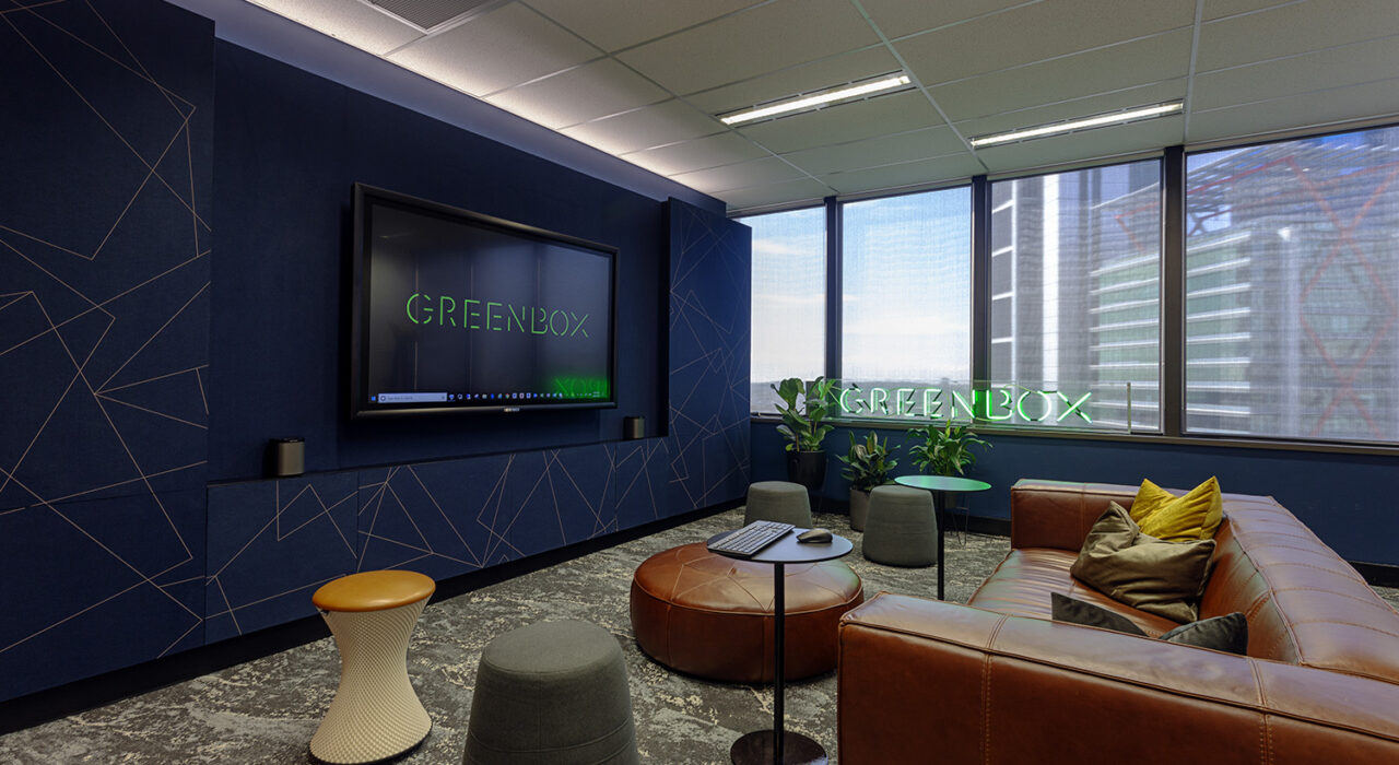 large blue acoustic wall with linear printed design in office