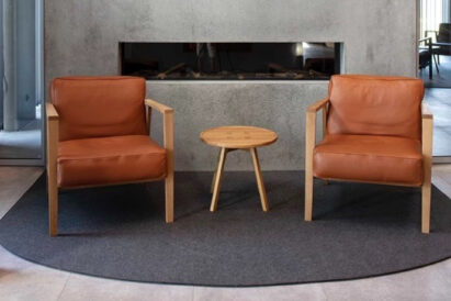 acoustic Fraster Felt Rug featured in Fraster's showroom under lounge seating