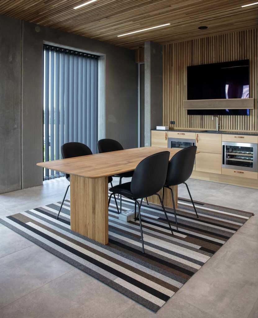 fraster-felt-rug-under-table-in-office-area