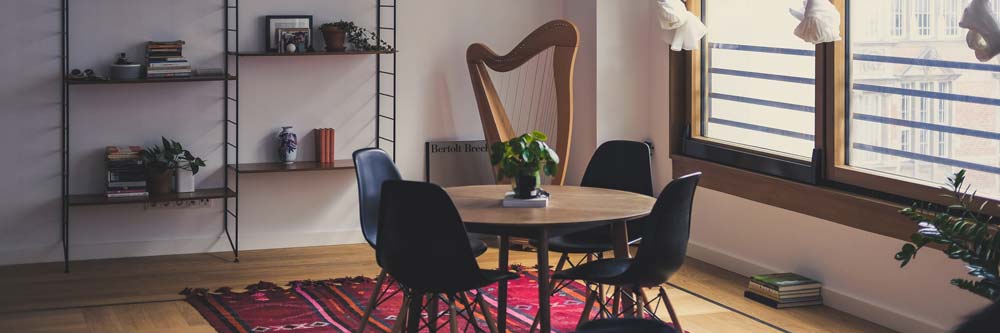 home dining room with harp