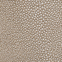 detail of a bubbly textured beige leather finish