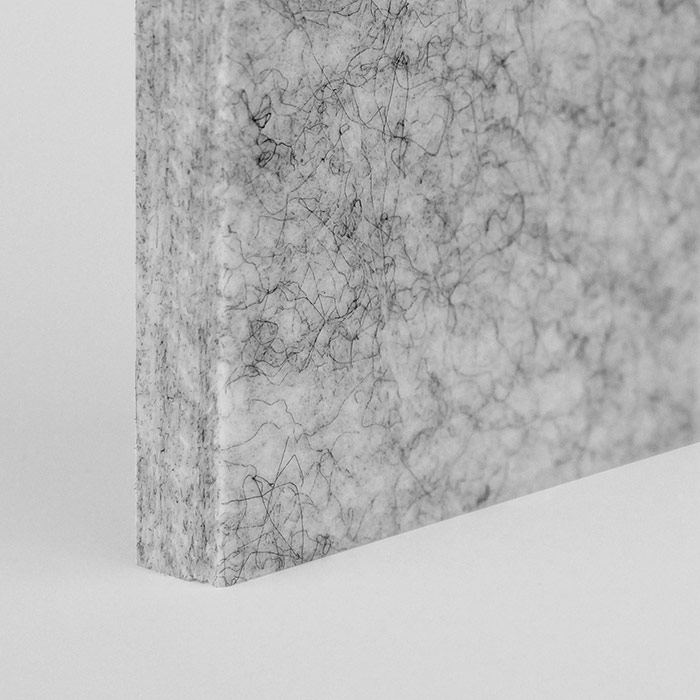 corner of a light grey acoustic panel