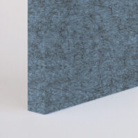corner of a greyish blue acoustic panel