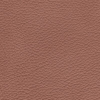 detail of a textured dark pink leather finish